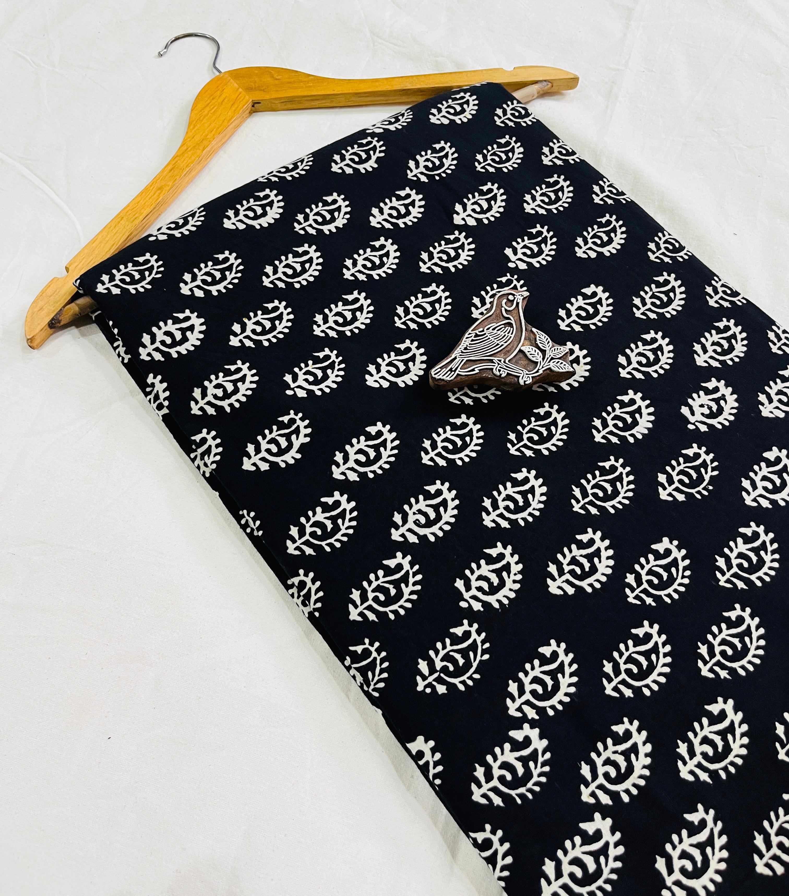 Black handcrafted Dabu print on pure cotton fabric, featuring mud-resist detailing for premium wholesale sourcing through Fabtex.